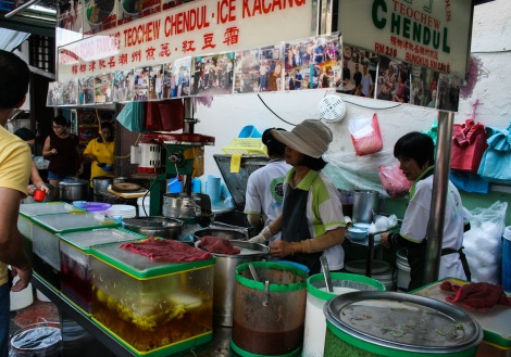 Lady making cendol in a market in Malaysia